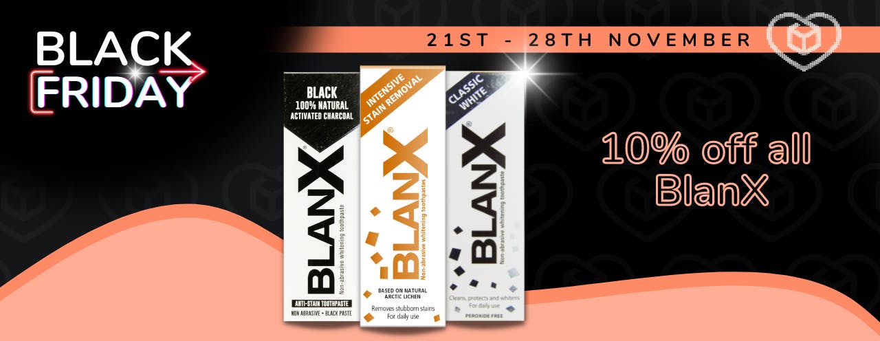 Three BlanX toothpastes on a black background
